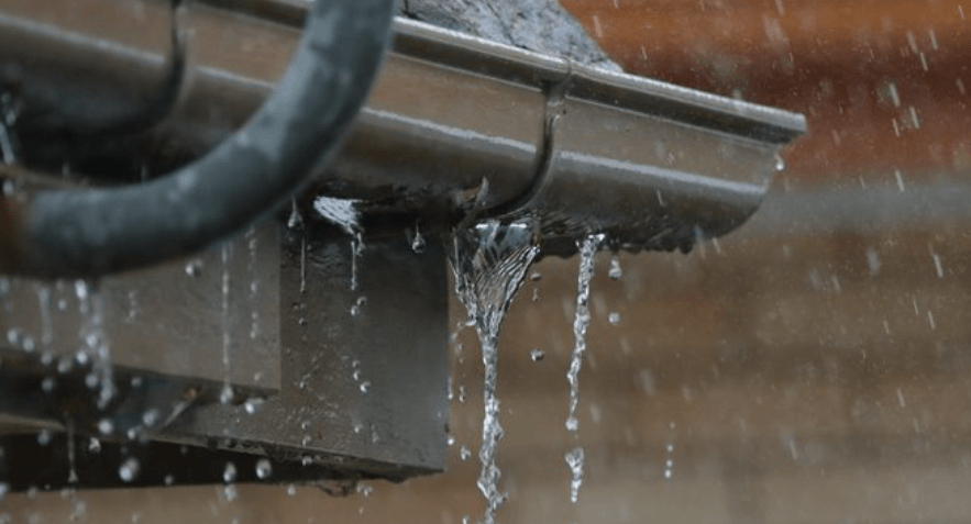 Why Water Drips Behind Gutters